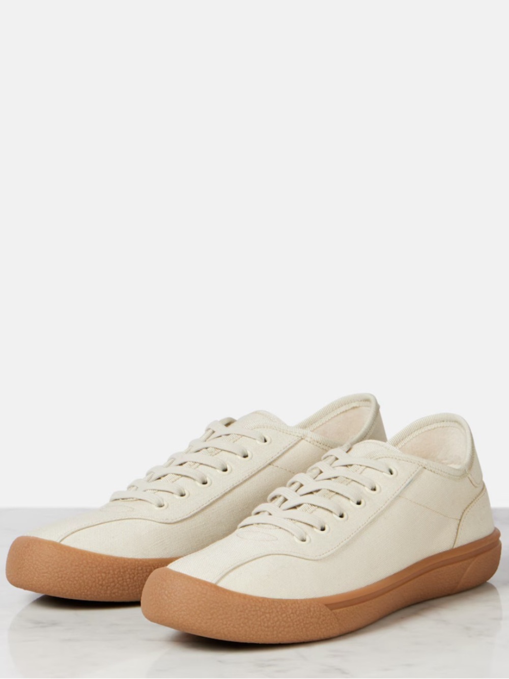 The Row Canvas Sneakers in Cream with Tan Sole